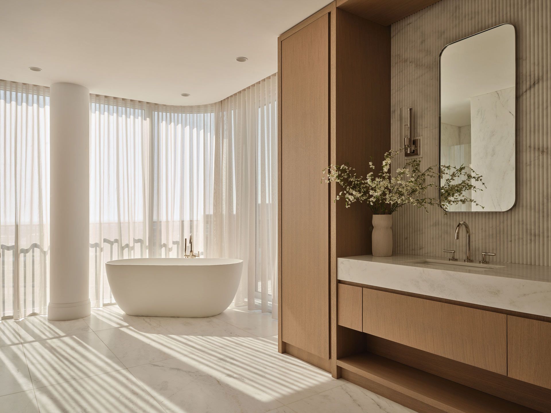Primary bathroom with freestanding tub