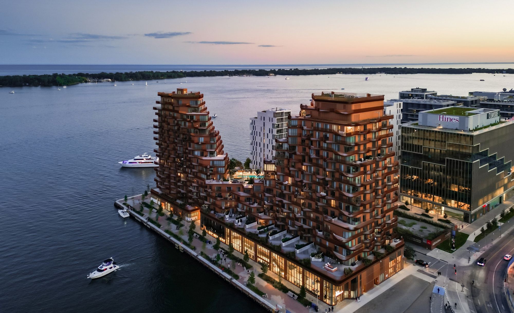 Aqualuna at Bayside on the Toronto waterfront at dusk, with Lake Ontario behind